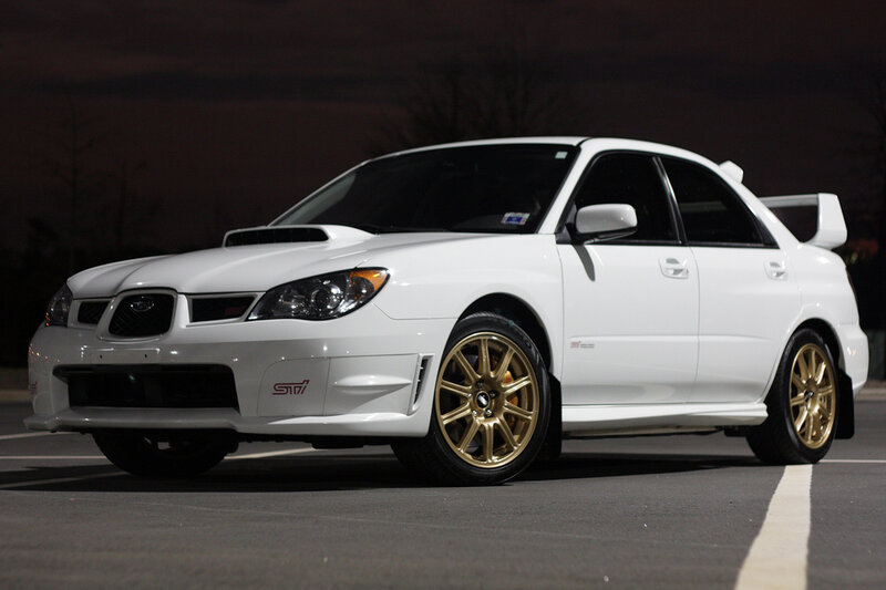white subaru wrx sti sedan