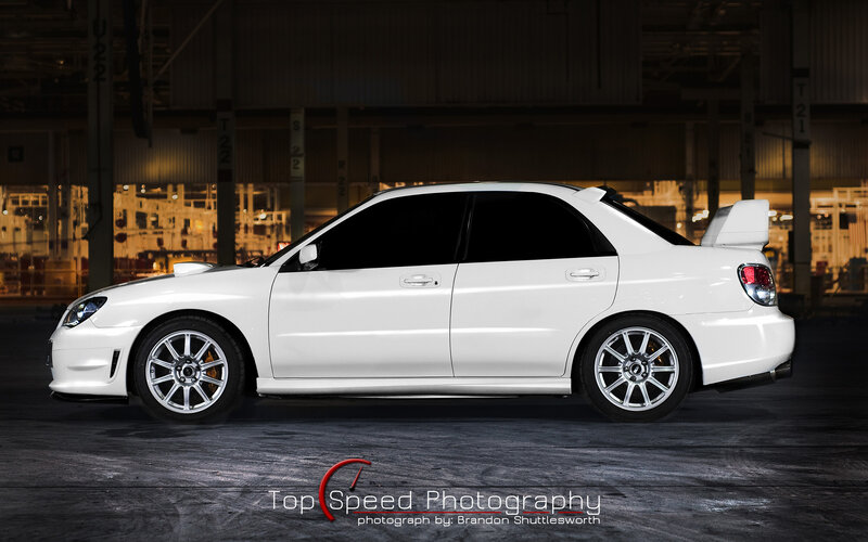 white subaru wrx sti sedan