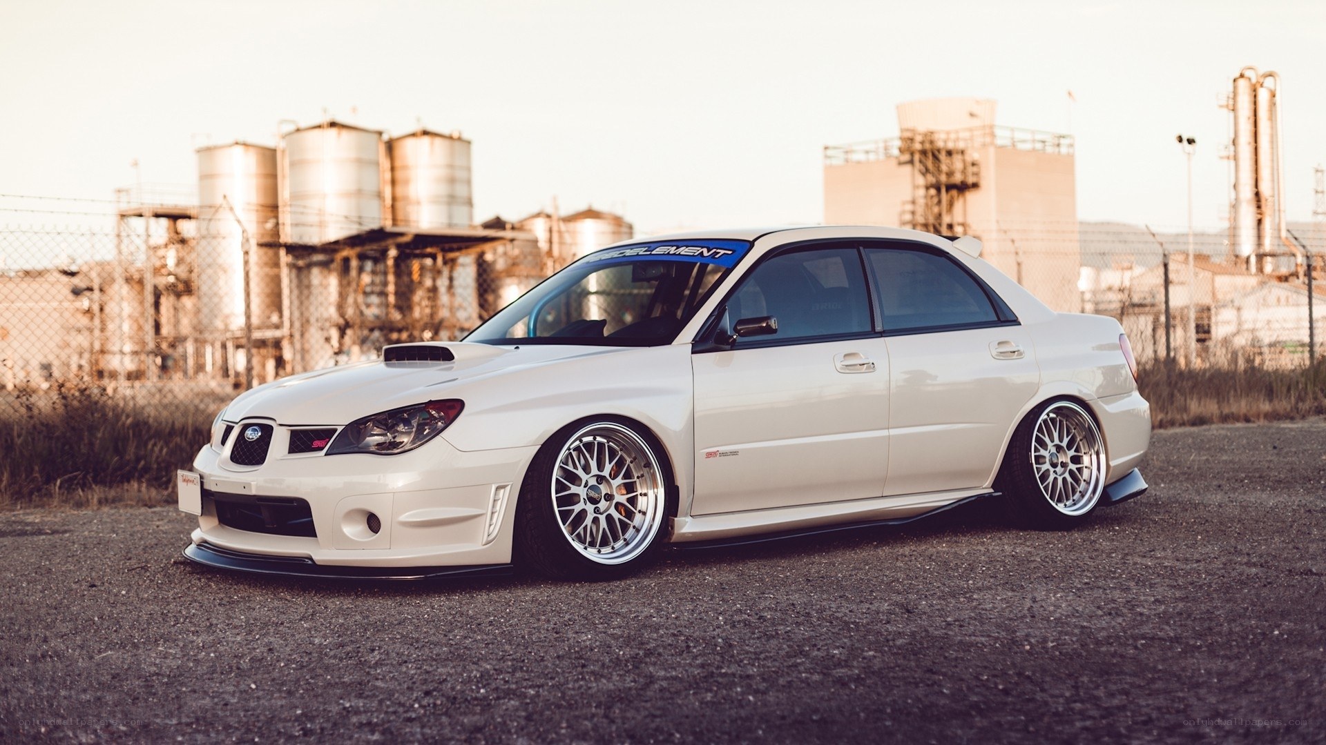 white subaru wrx sti sedan