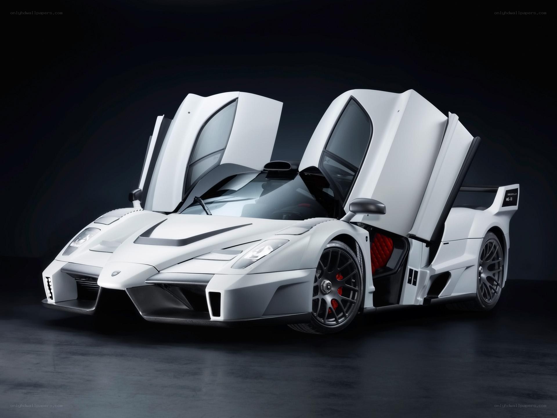 white supercar with doors open