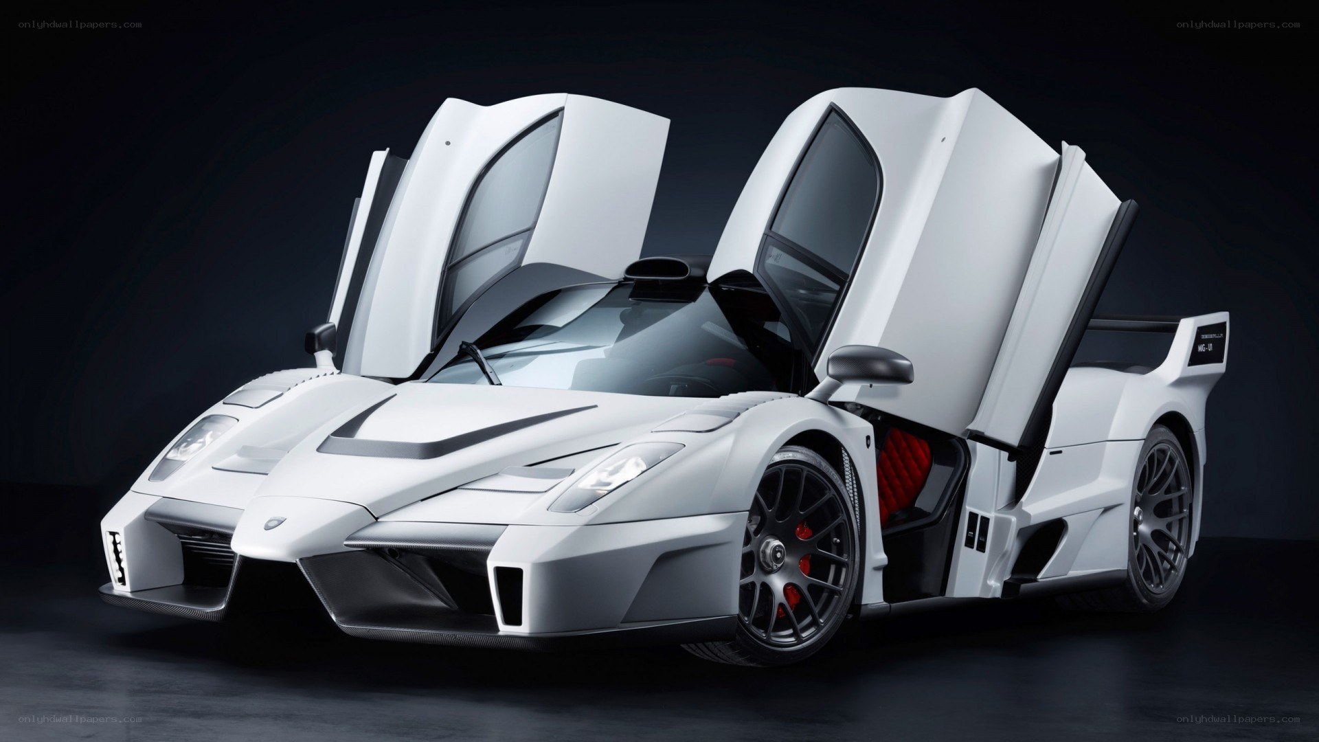 white supercar with doors open
