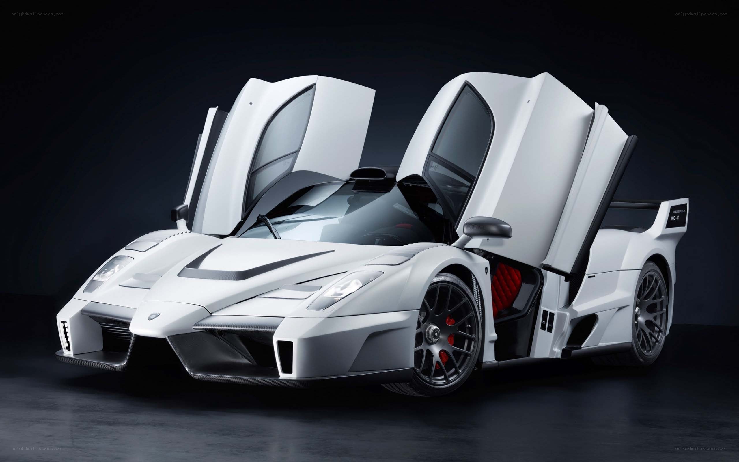 white supercar with doors open