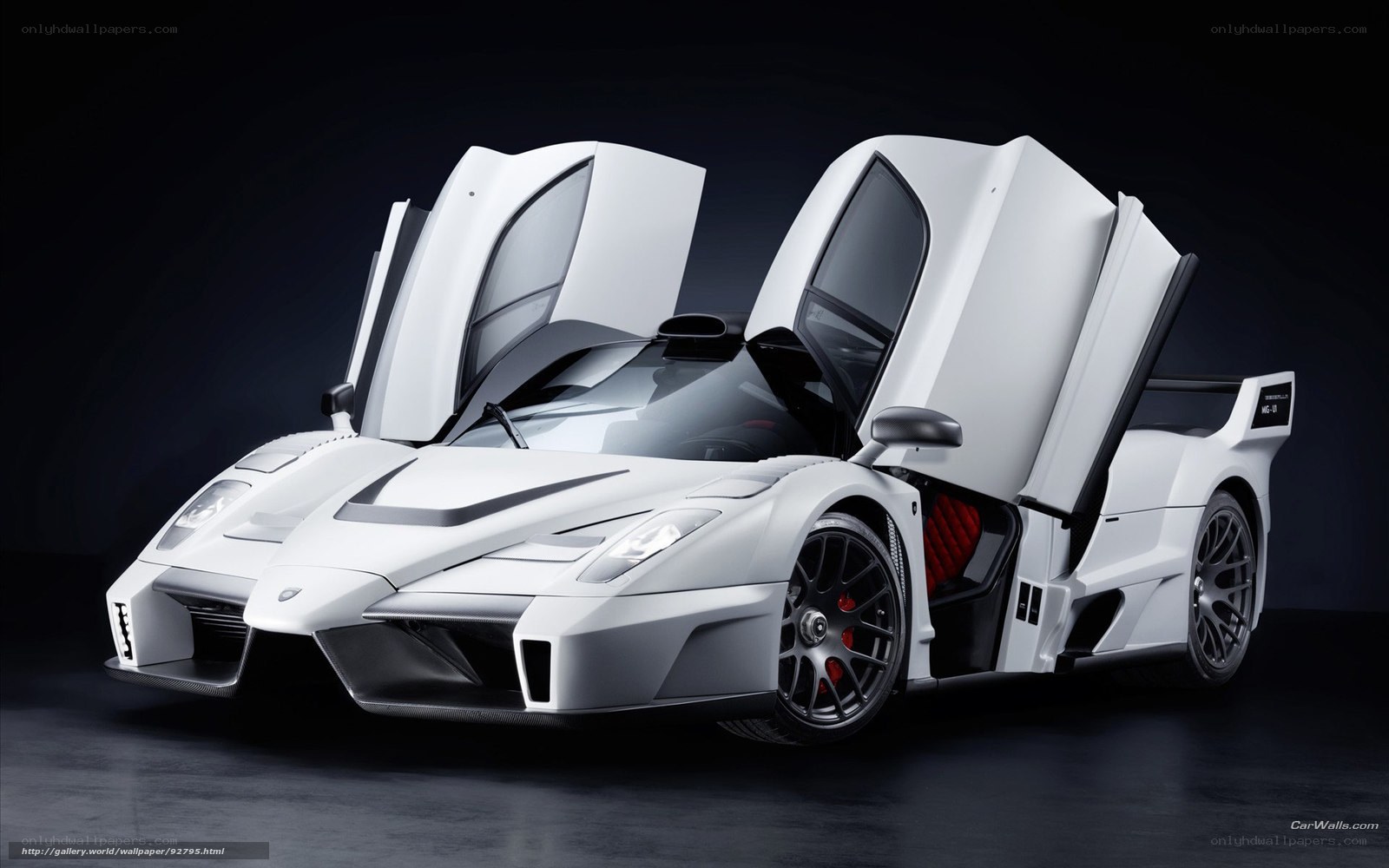 white supercar with doors open