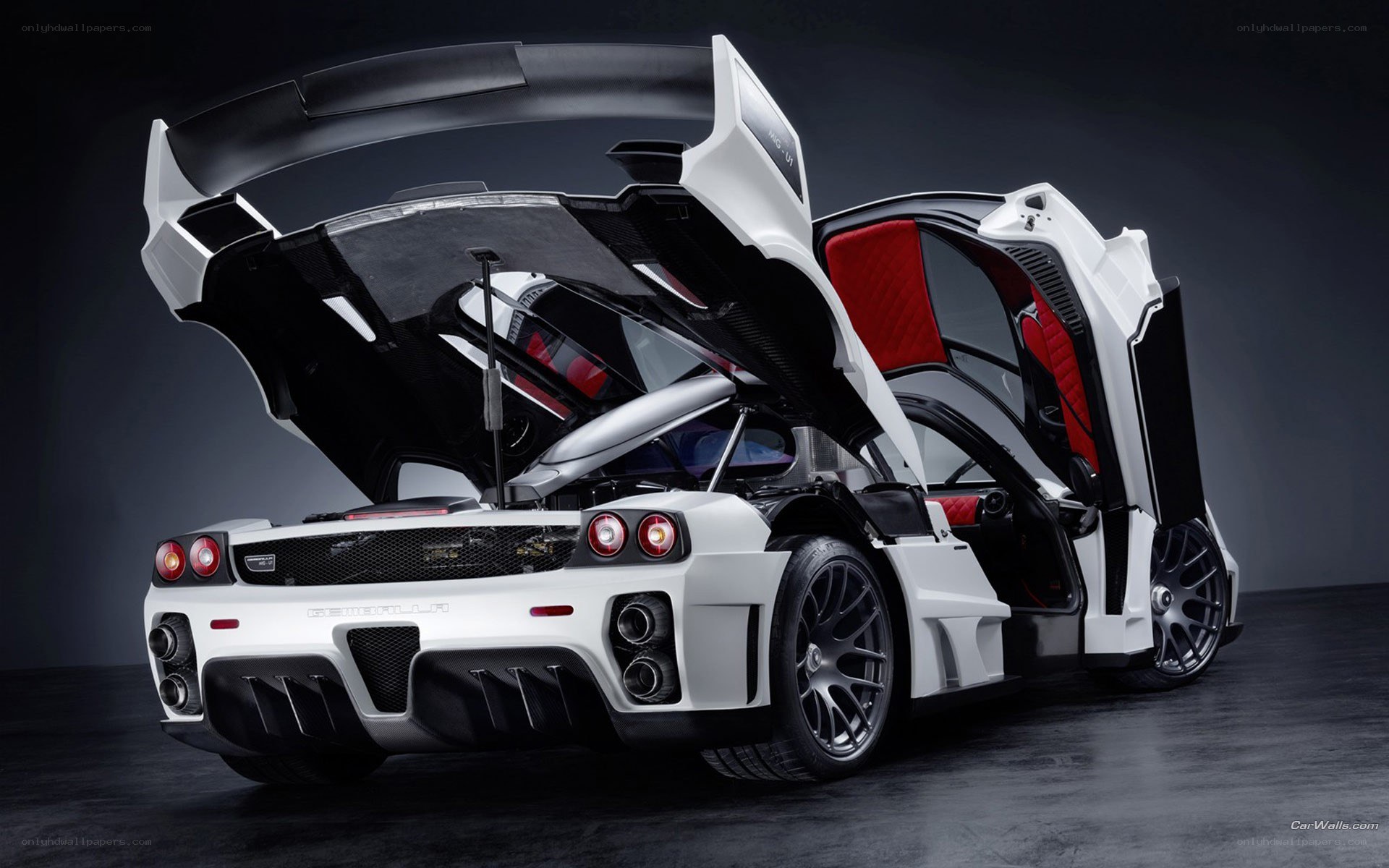 white supercar with open doors