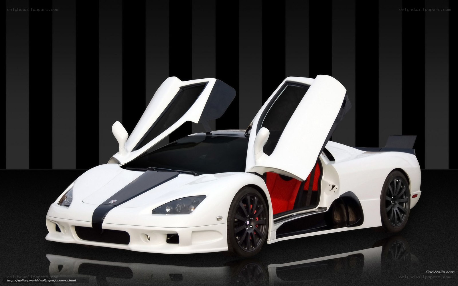 White supercar with open doors
