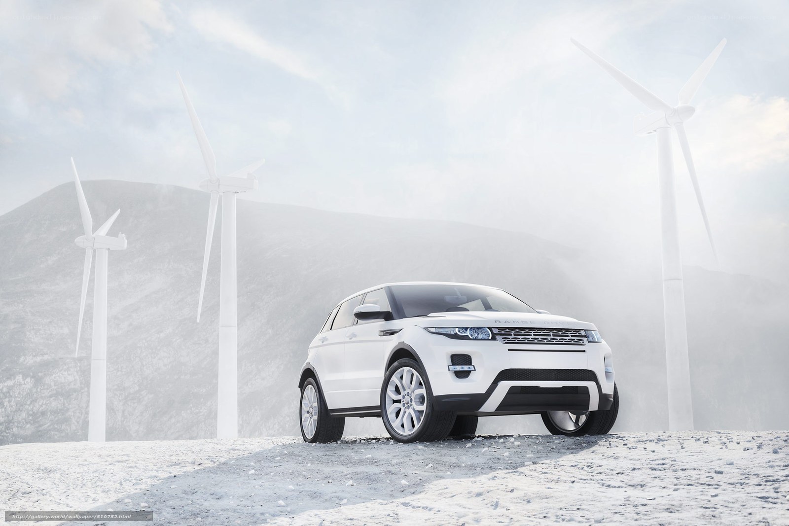 White SUV in a wind farm