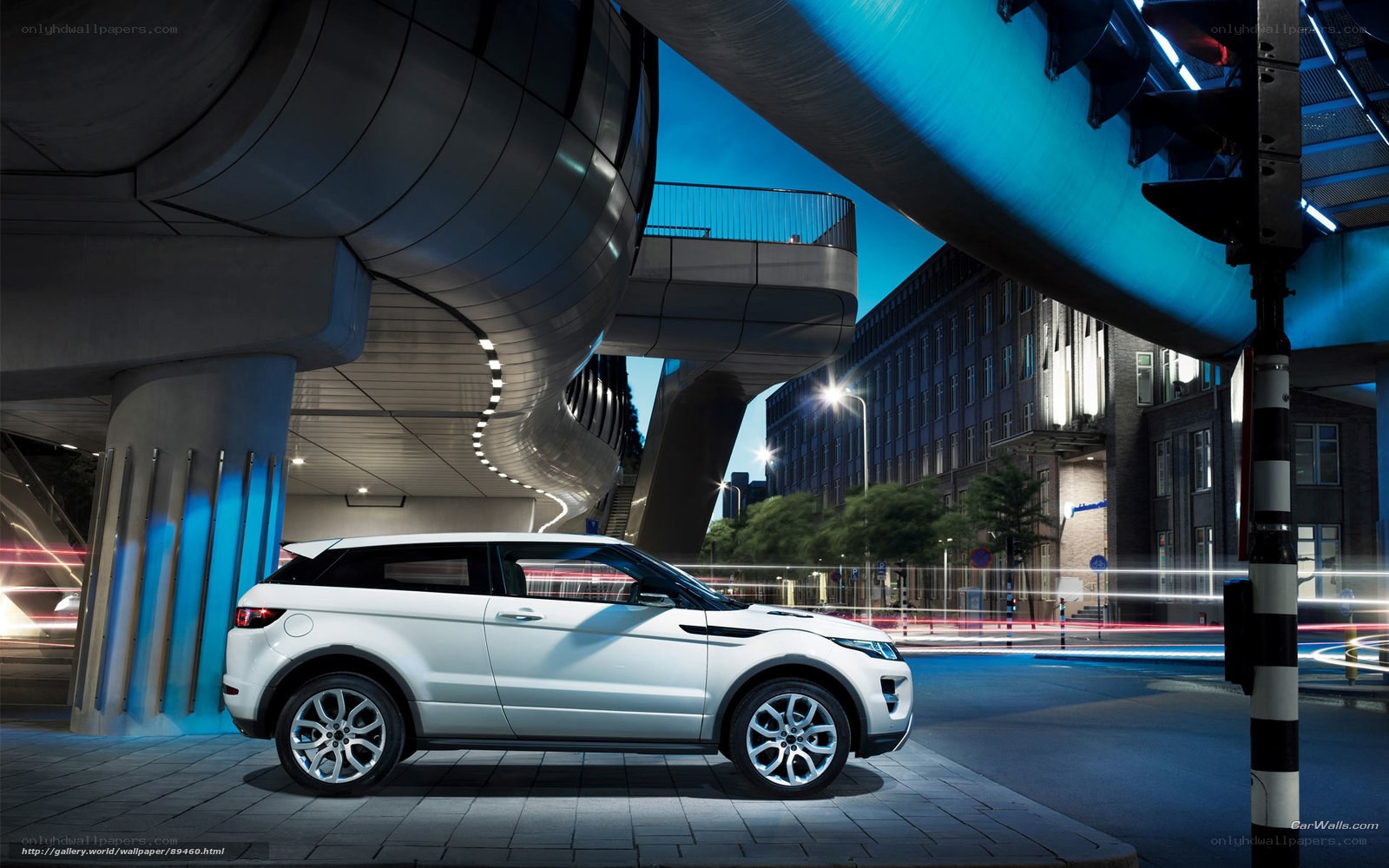 White SUV in futuristic city