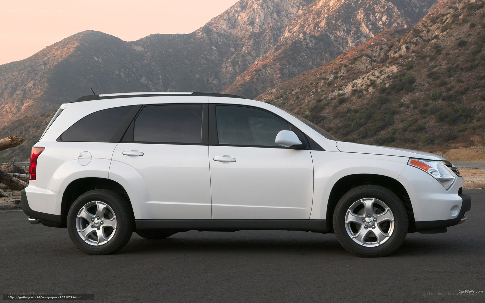 white suv in mountain landscape