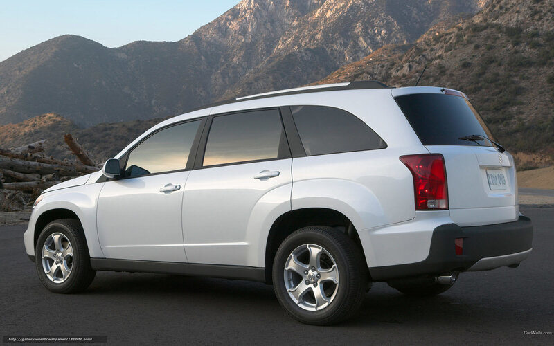 white suv in mountain setting