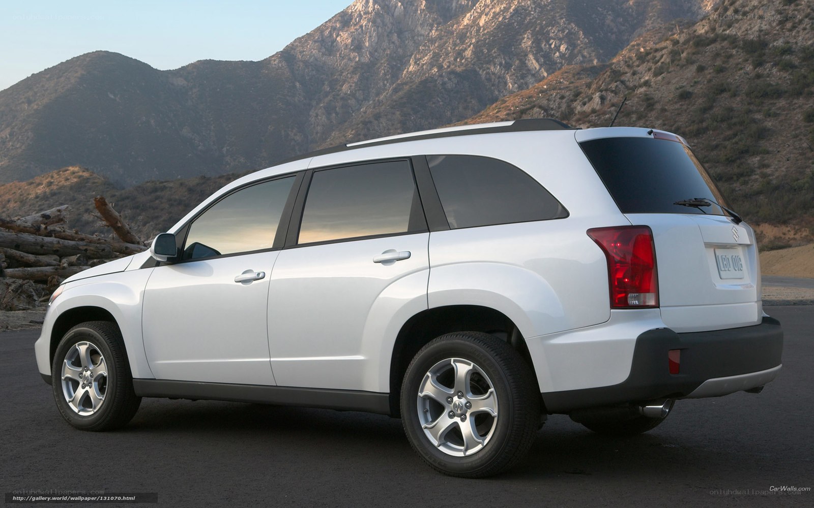 white suv in mountain setting