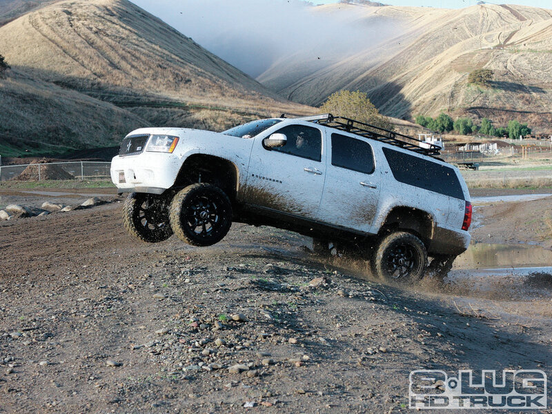 White Suv in Mud