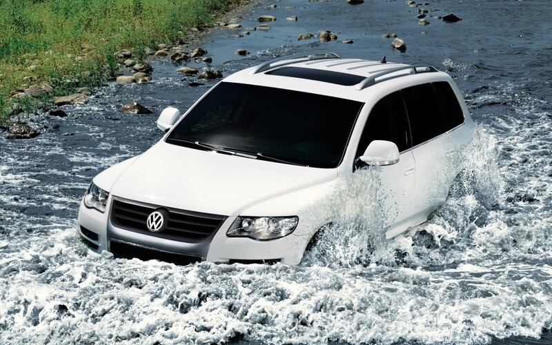 White Suv in River