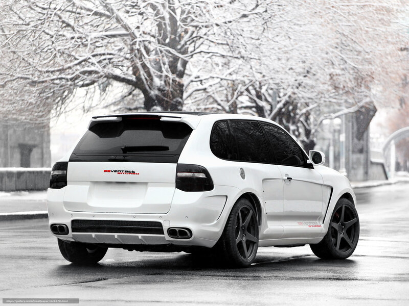 white suv in snowy city