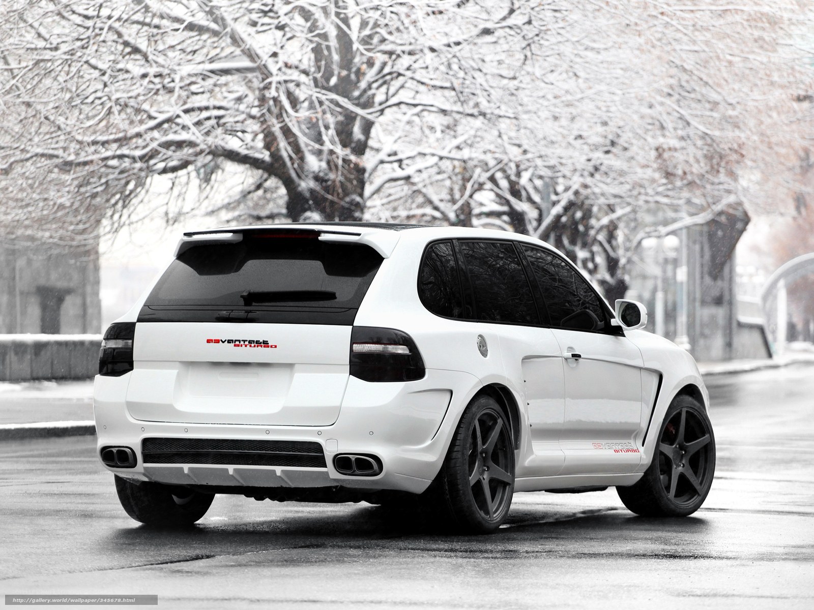 white suv in snowy city