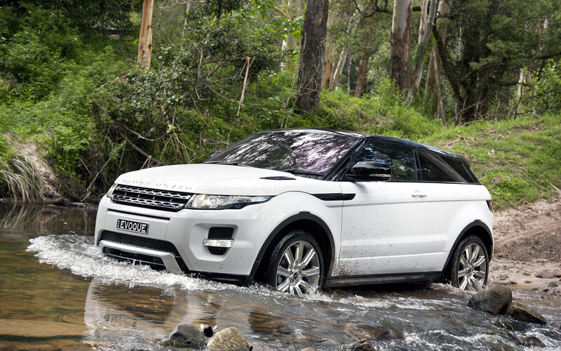 White SUV in Stream — Outdoor