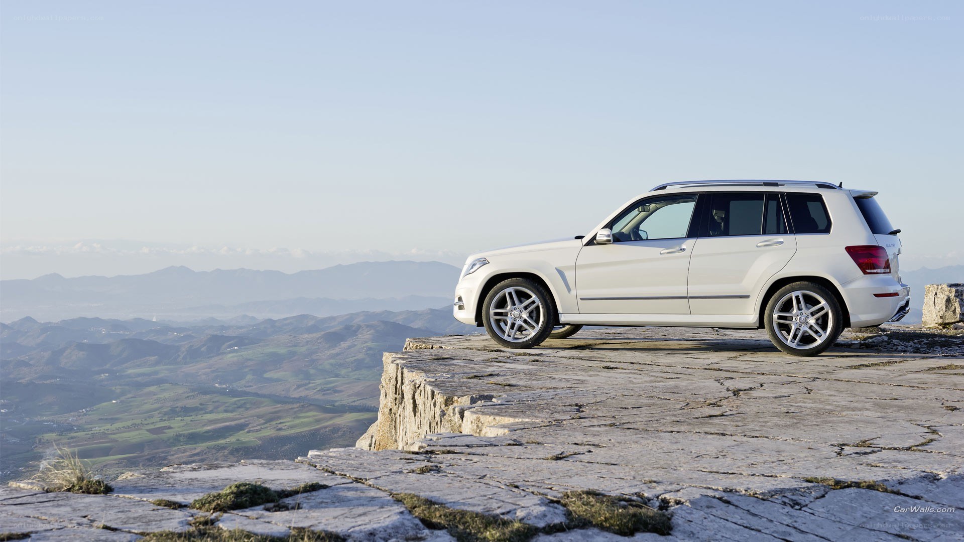 White SUV on a cliff