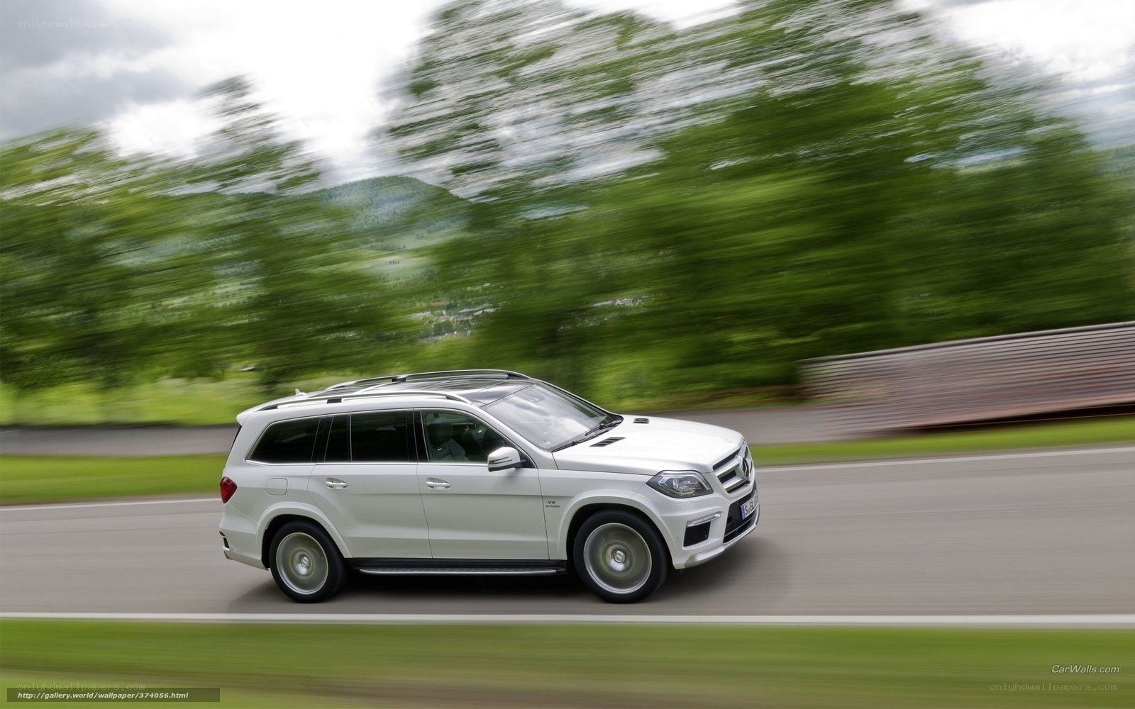 white suv on a road
