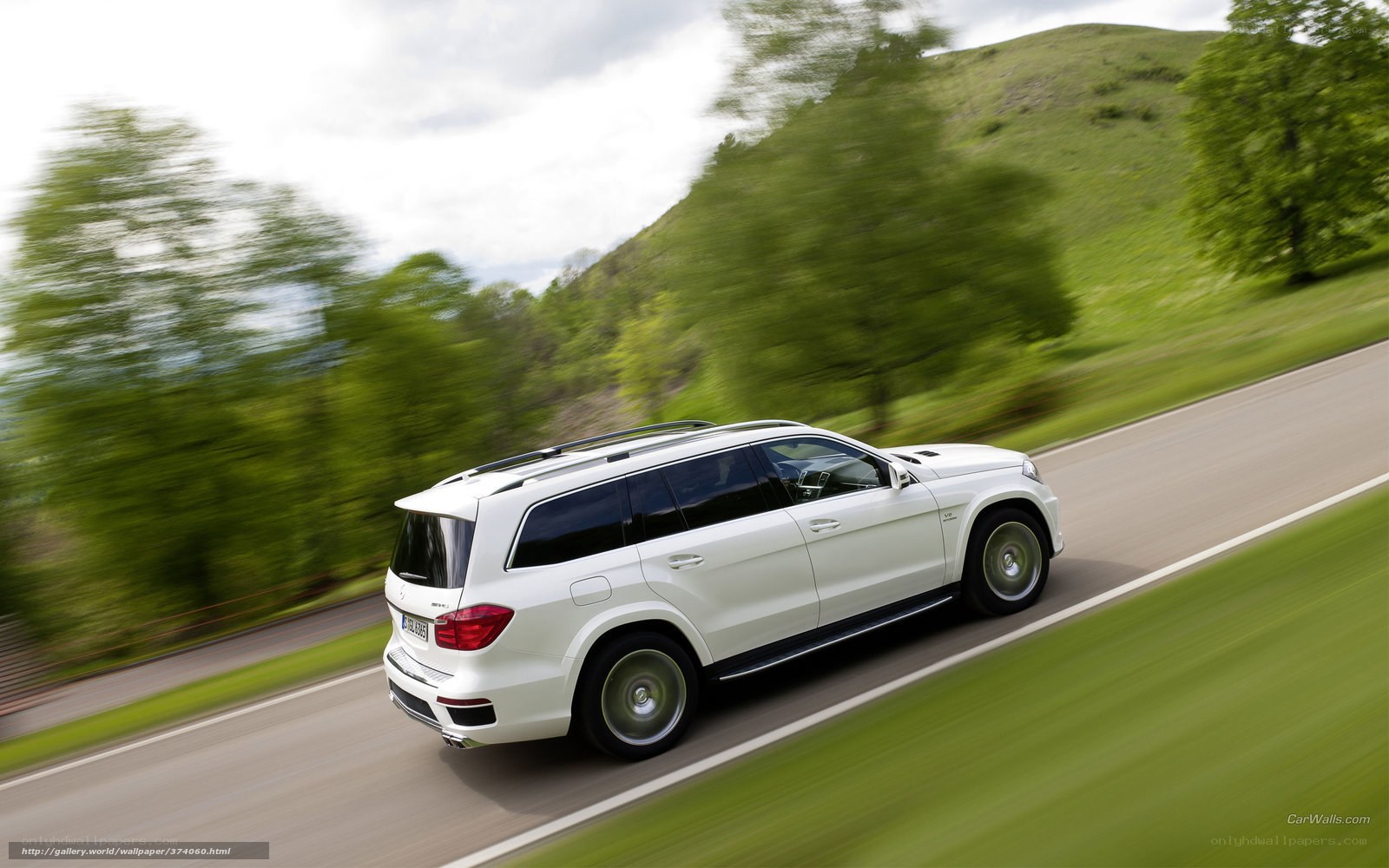 white suv on country road