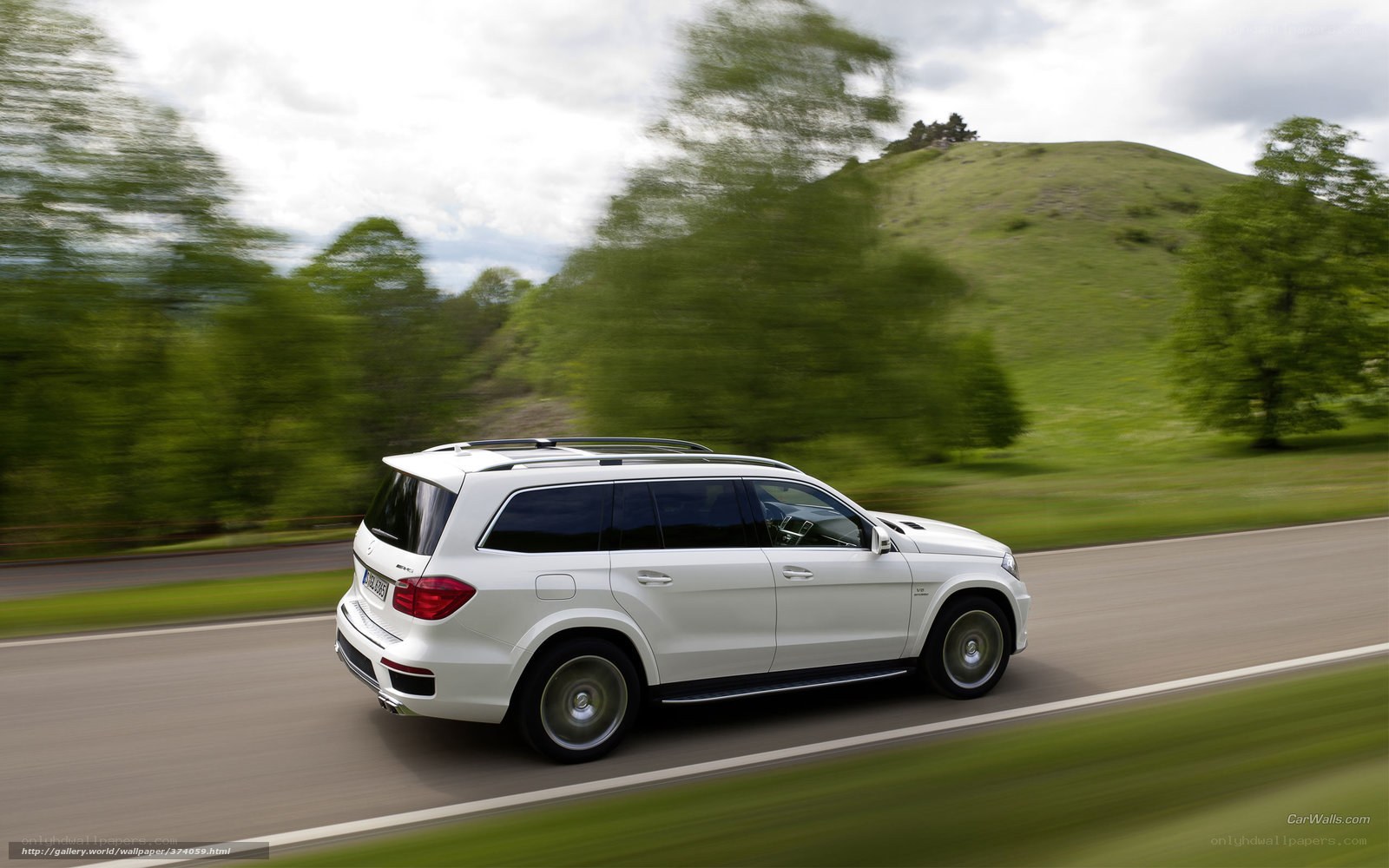 white suv on country road