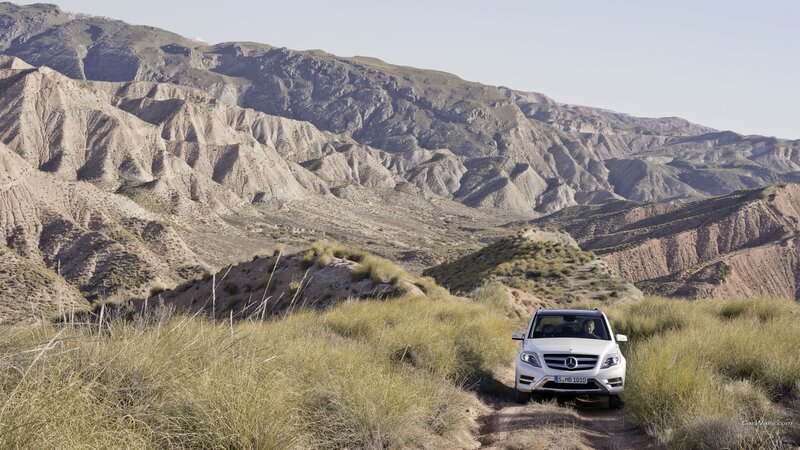 White SUV on Dirt Path