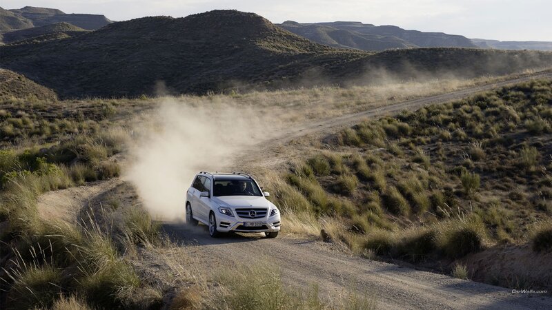 White SUV on Dirt Road — Brown, Dusty