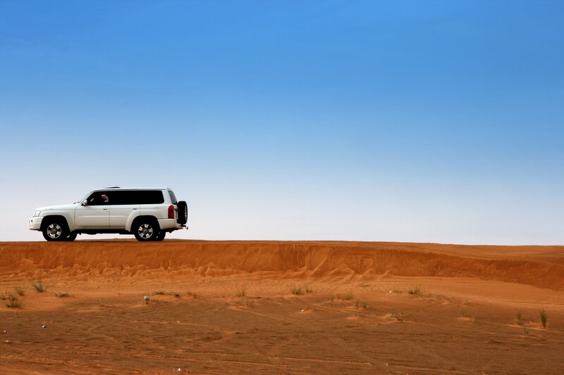 White Suv on Dune