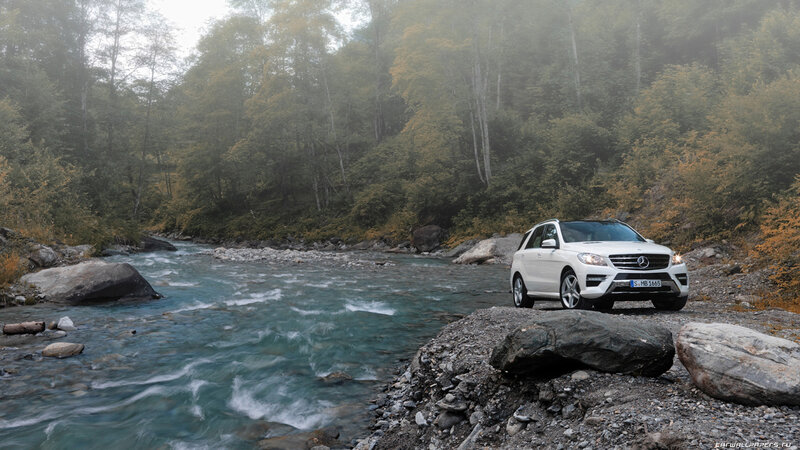 White Suv on Riverbank