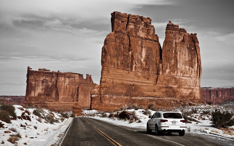 White Suv on Road — Brown
