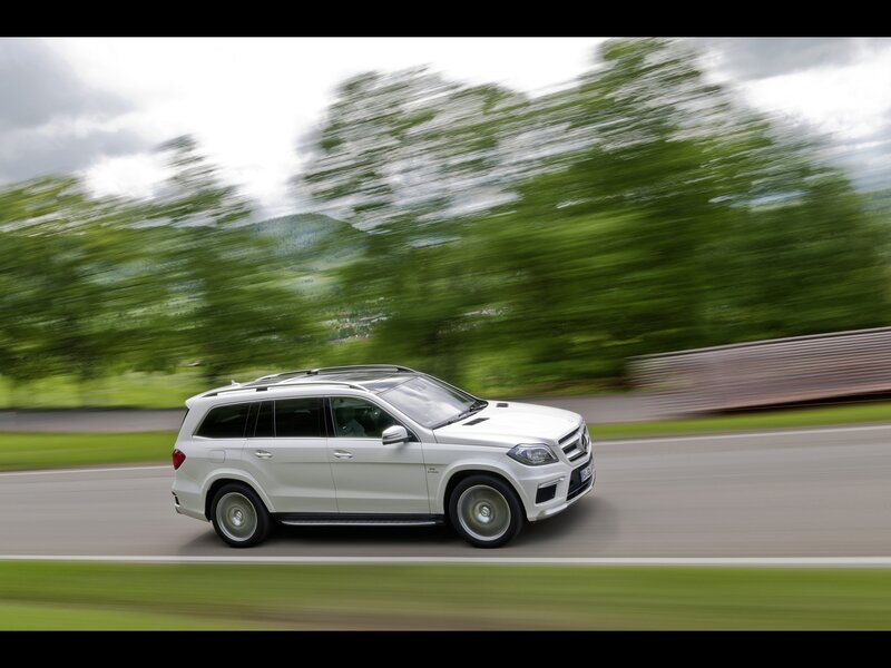 White SUV on Road — Dynamic, Afternoon, Photograph, Car