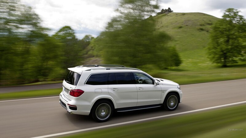 White SUV on Road — Dynamic, Afternoon, Photograph, Trees, Hill