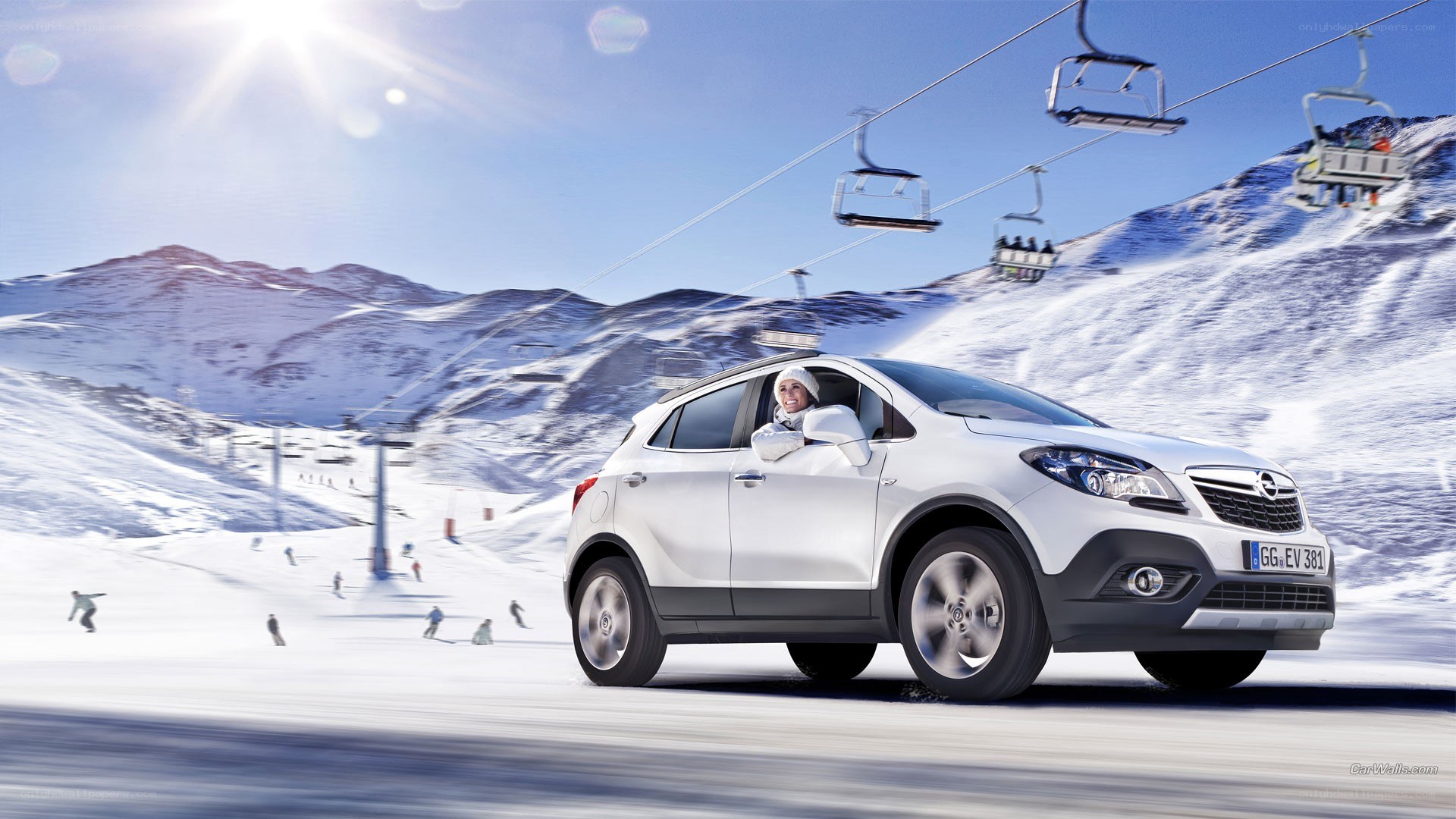 White SUV on snowy mountain