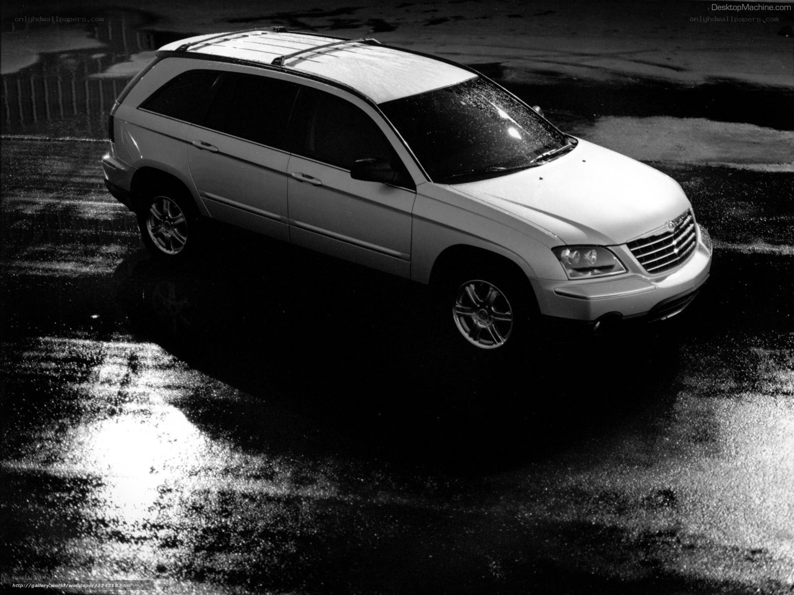 White SUV on wet pavement
