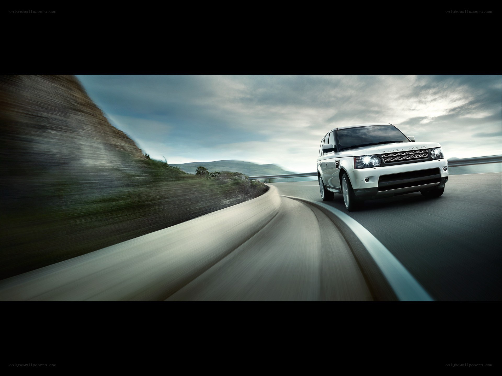 White SUV on winding road
