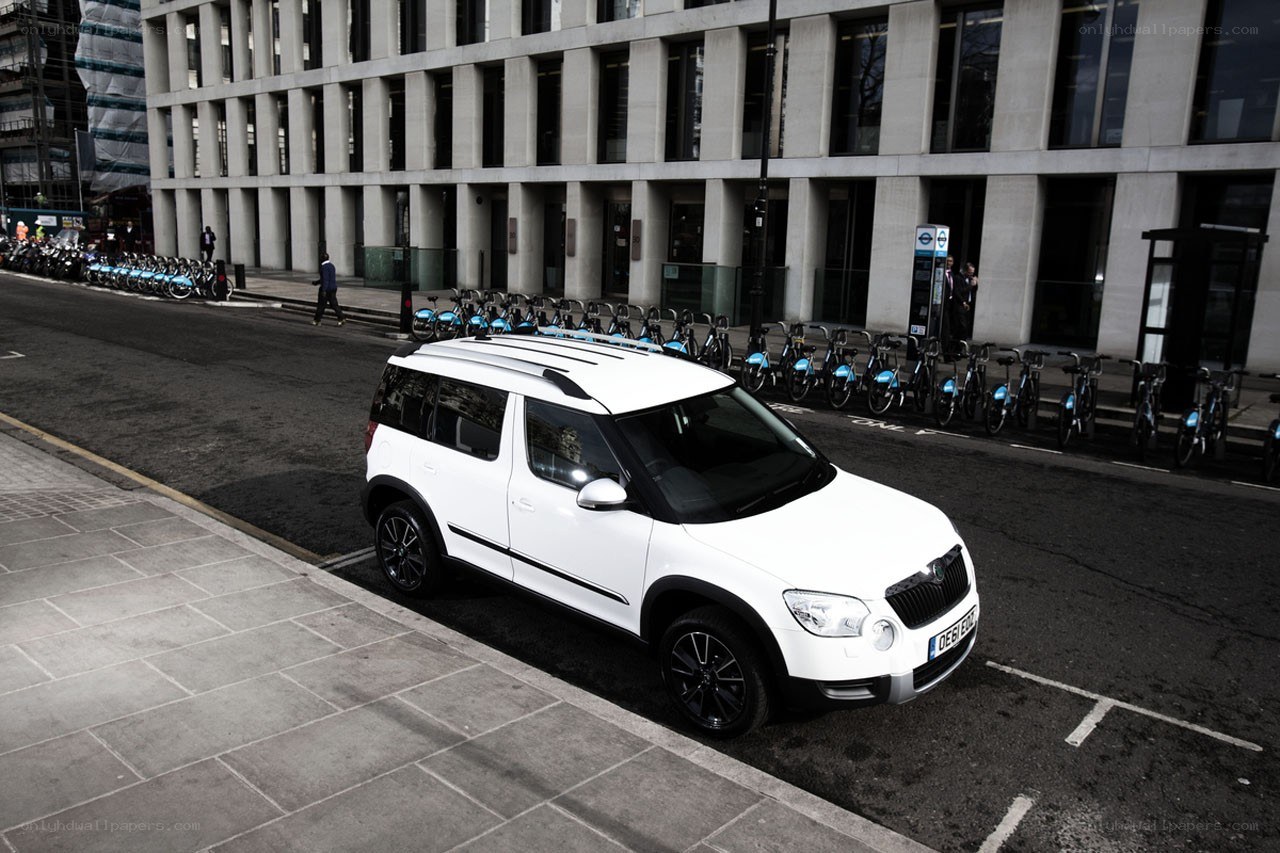 White SUV parked on city street