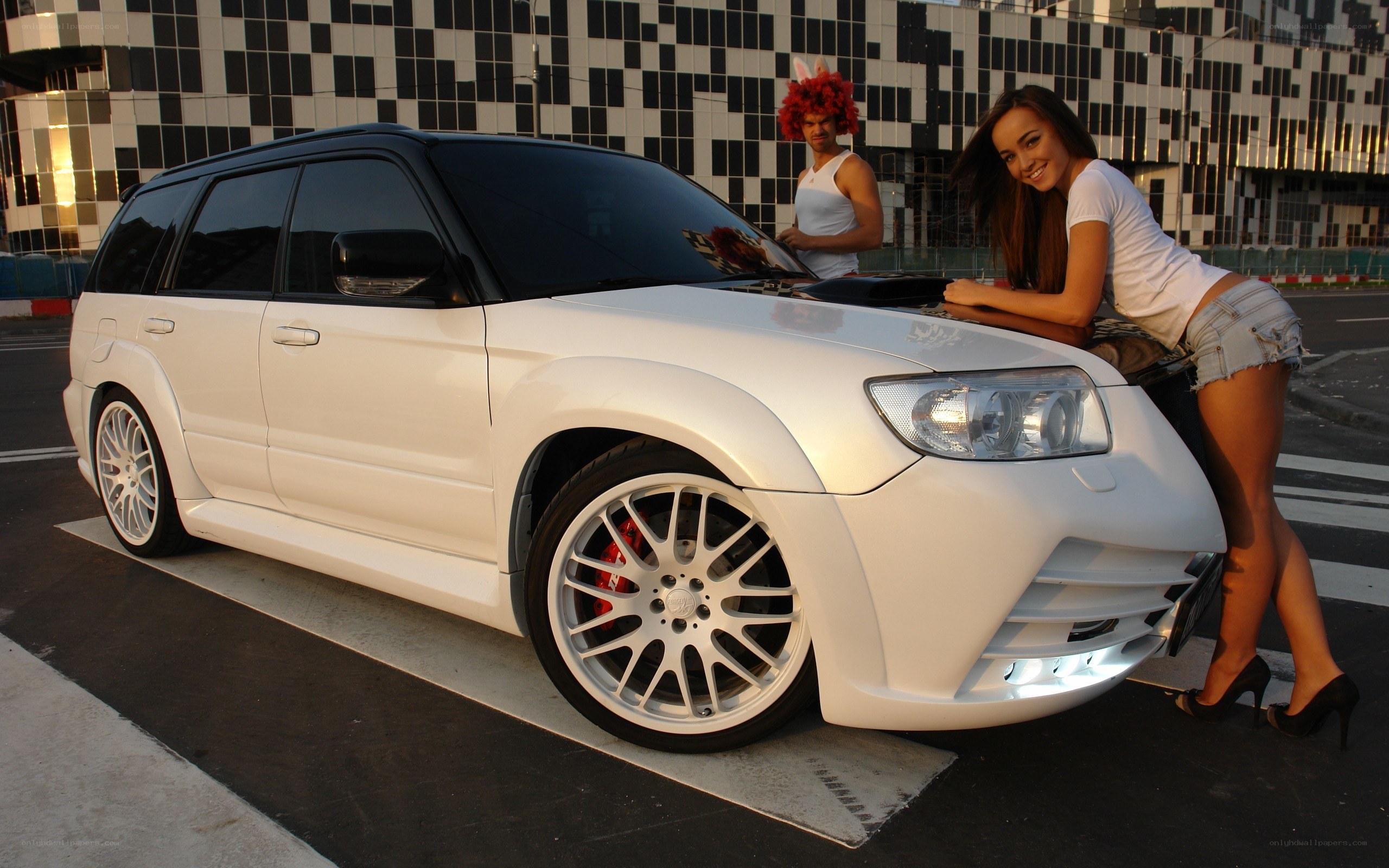 White SUV with models