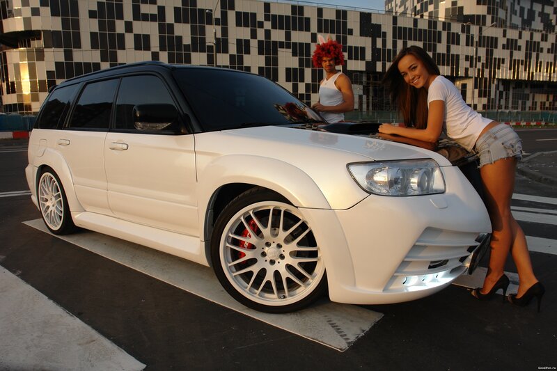 White SUV with models
