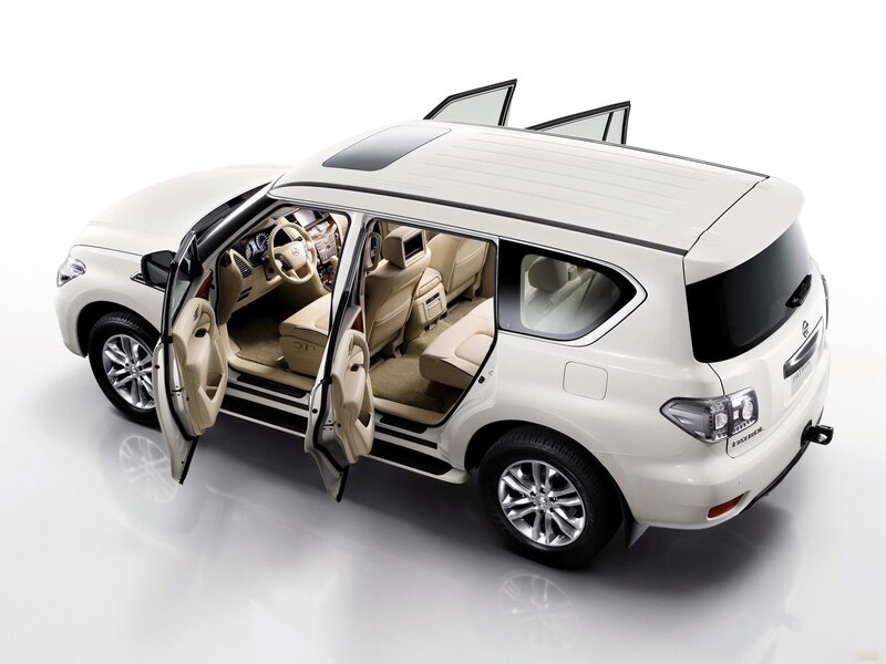 White SUV with open doors