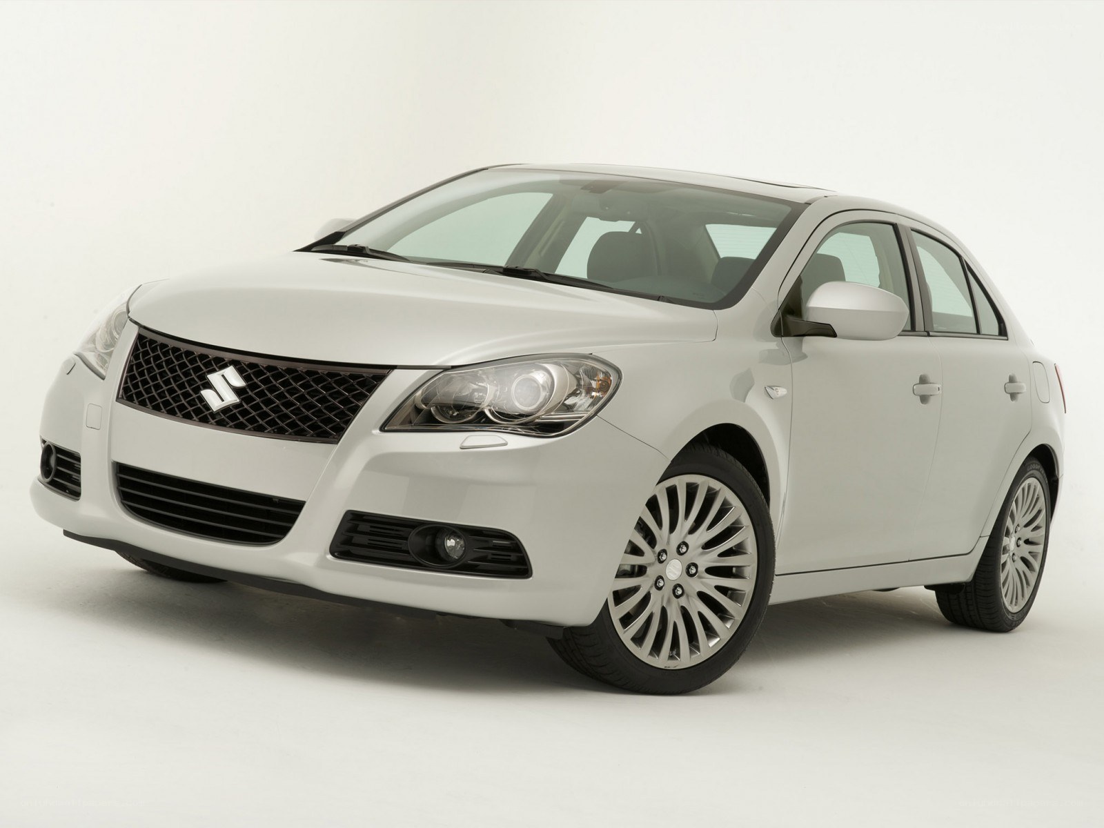 white suzuki sedan car