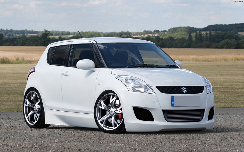 white suzuki swift hatchback