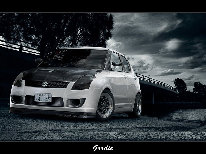 White Suzuki Swift on a bridge