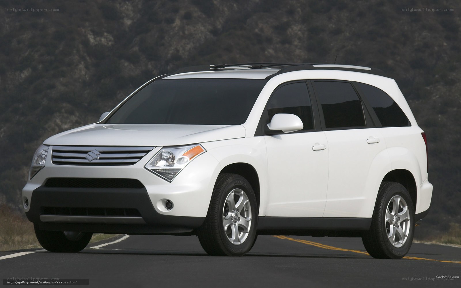 White Suzuki SX4 on a road