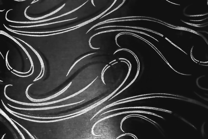 White Swirls on Black Fabric