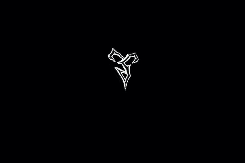 white symbol on black background