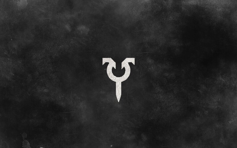 white symbol on dark background