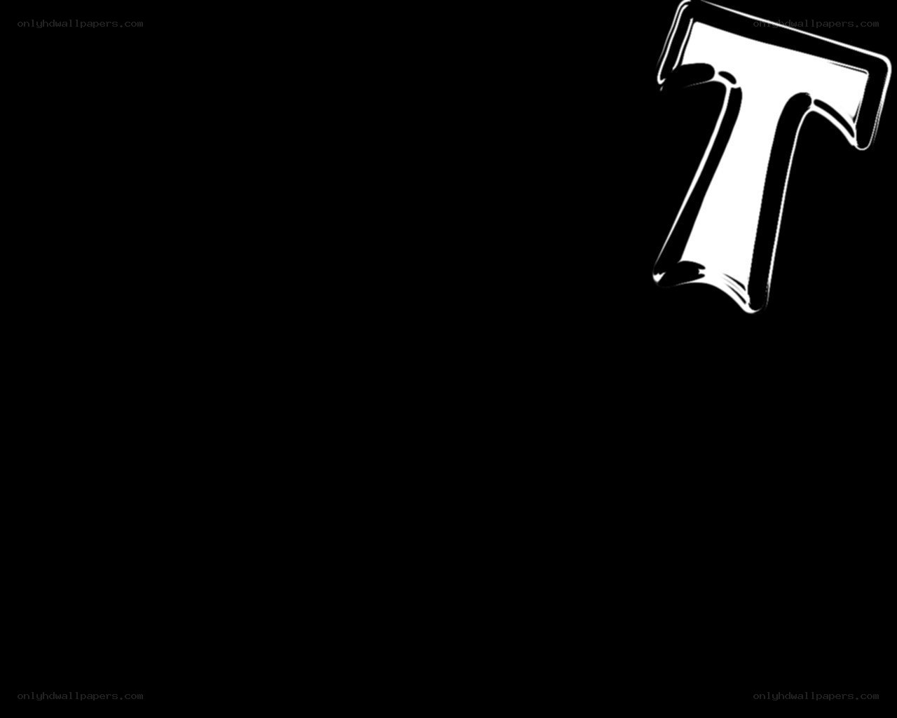 white T letter on black background