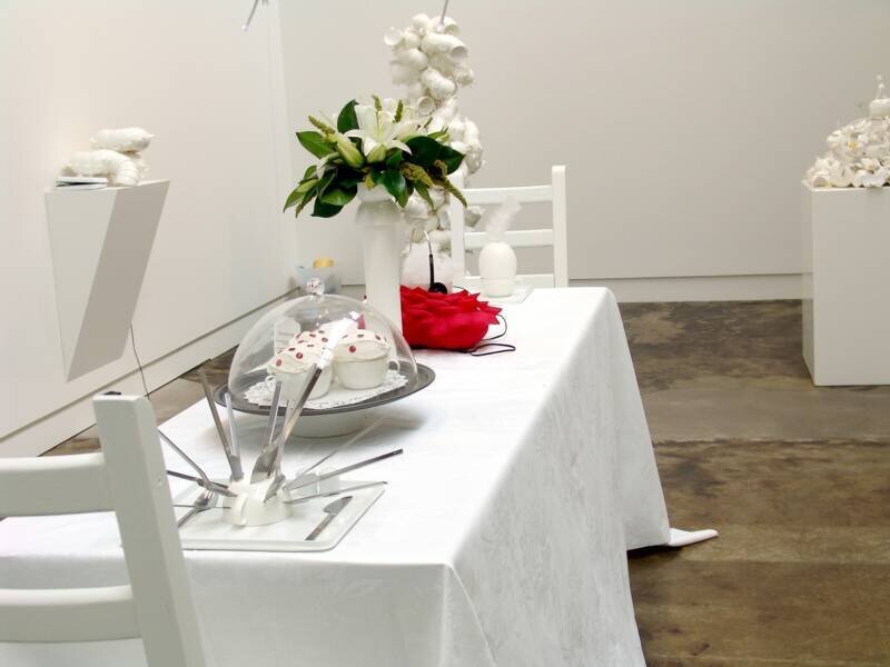 white table setting with flowers