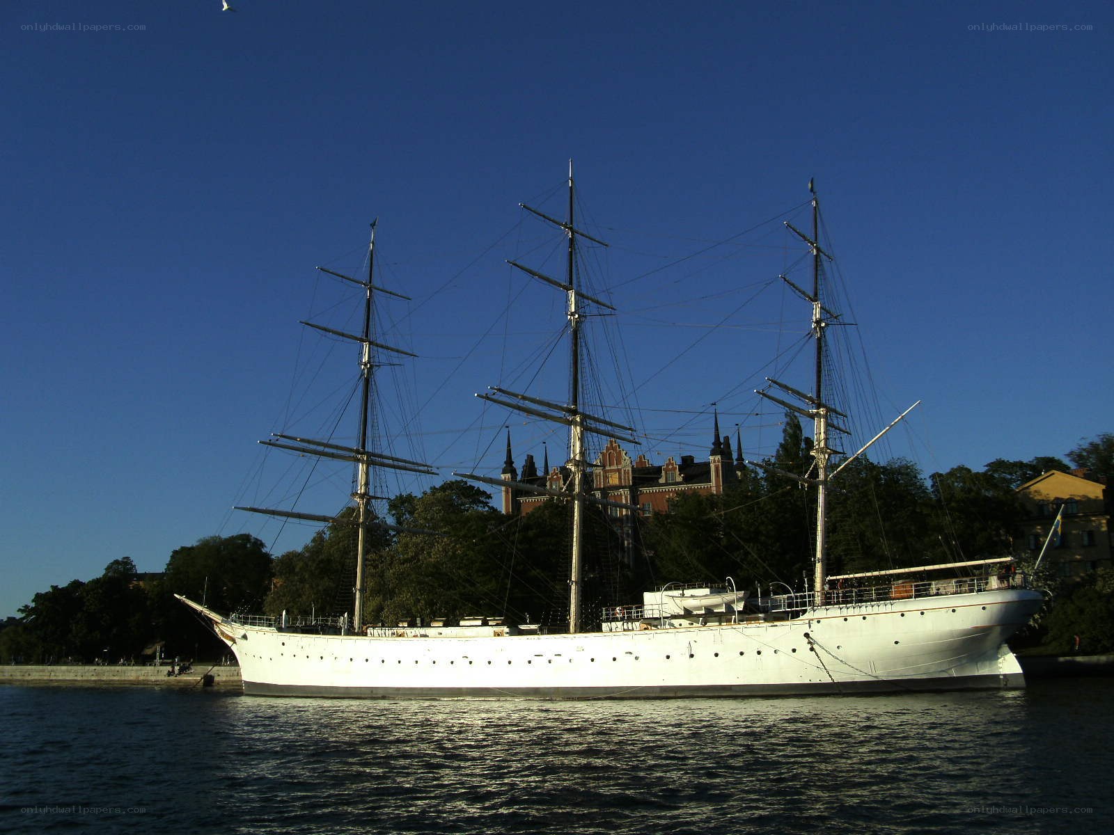 White tall ship on water
