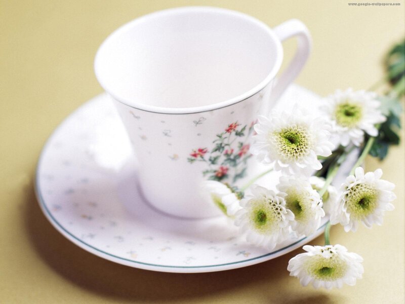 White Teacup with Flowers