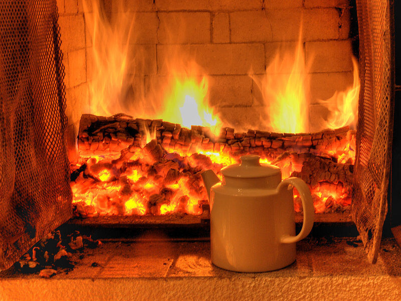 White Teapot by Fire