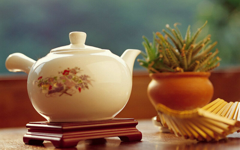 White Teapot on Stand